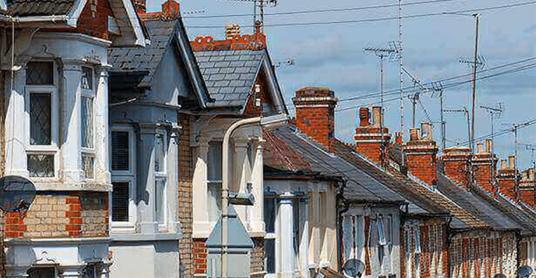 row of houses rooftops - l