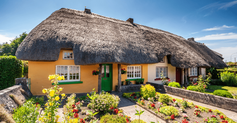 Traditional thatched roof cottage.