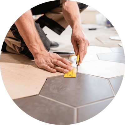 Hexagonal floor tiles being measured