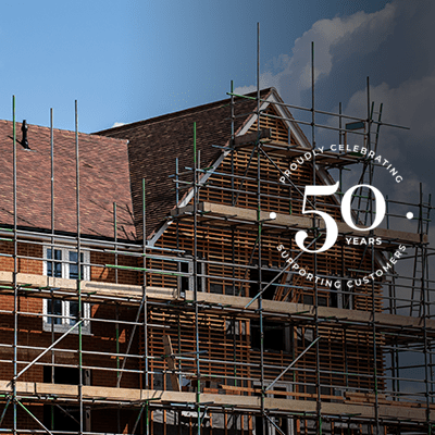 A wide shot of a house in construction.