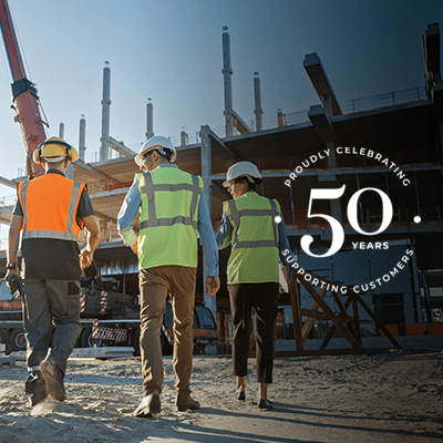 A wide shot of builders at a building site.