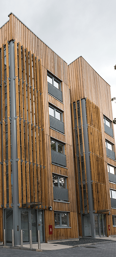 A wide shot of wood panelled student accommodation.