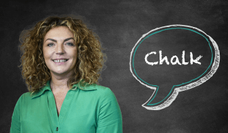 Blackboard with speech bubble saying Chalk on the right and a woman smiling on the left