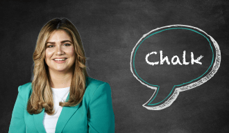 Blackboard with speech bubble saying Chalk on the right and a woman in a green-blue suit on the left